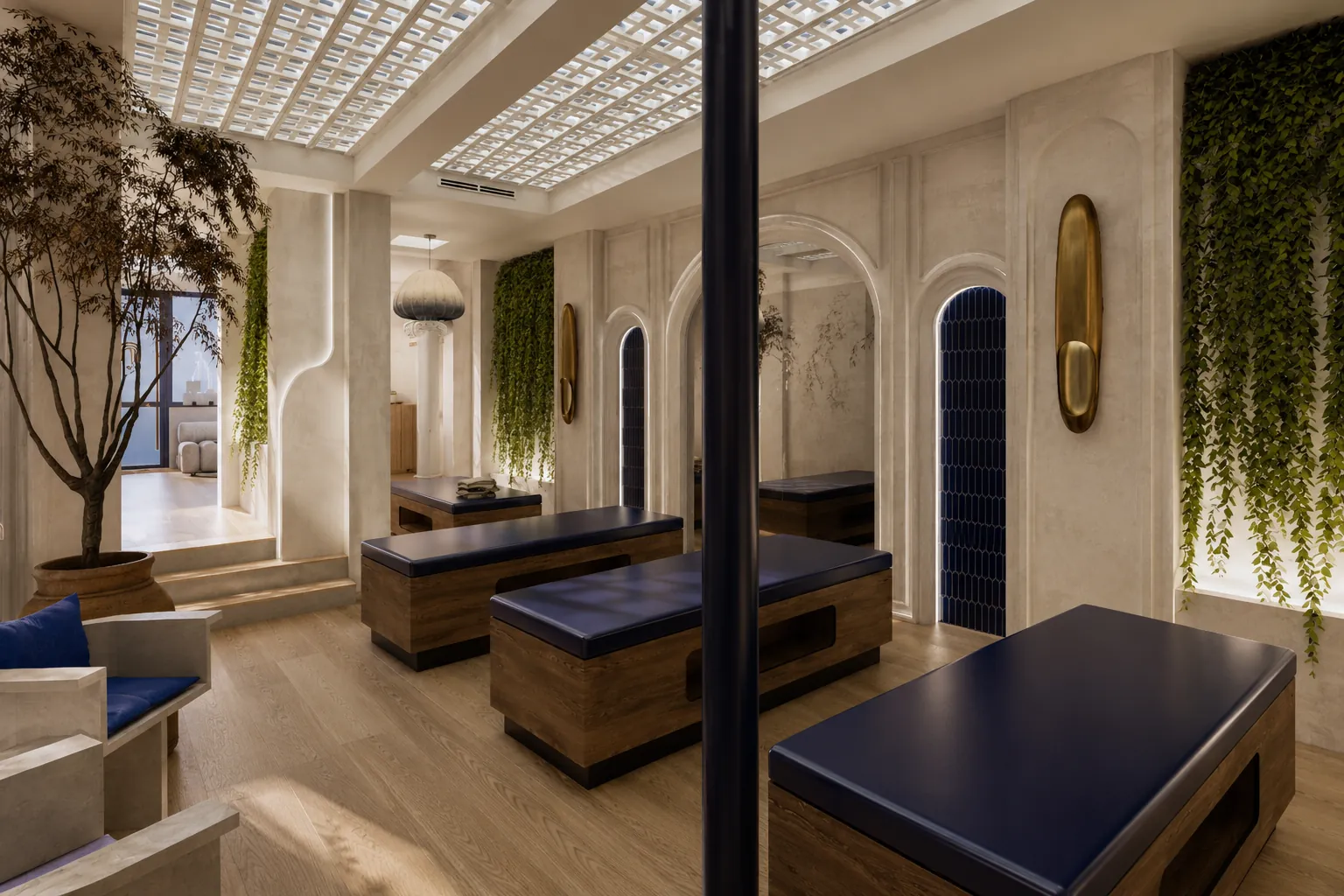 La salle de stretching sous ses arches : tables bleues, bois clair et plafond à caissons